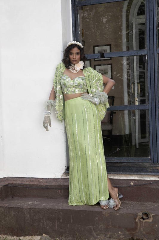 "Sorrell" Cape with embroidered blouse and "Reaf" skirt.