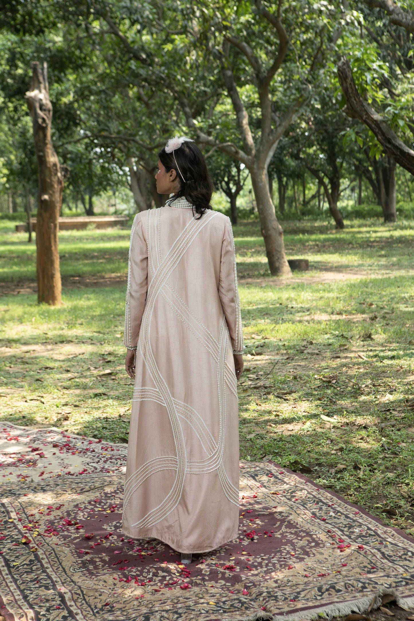 "Coquille" Jacket, bustier & drape skirt.