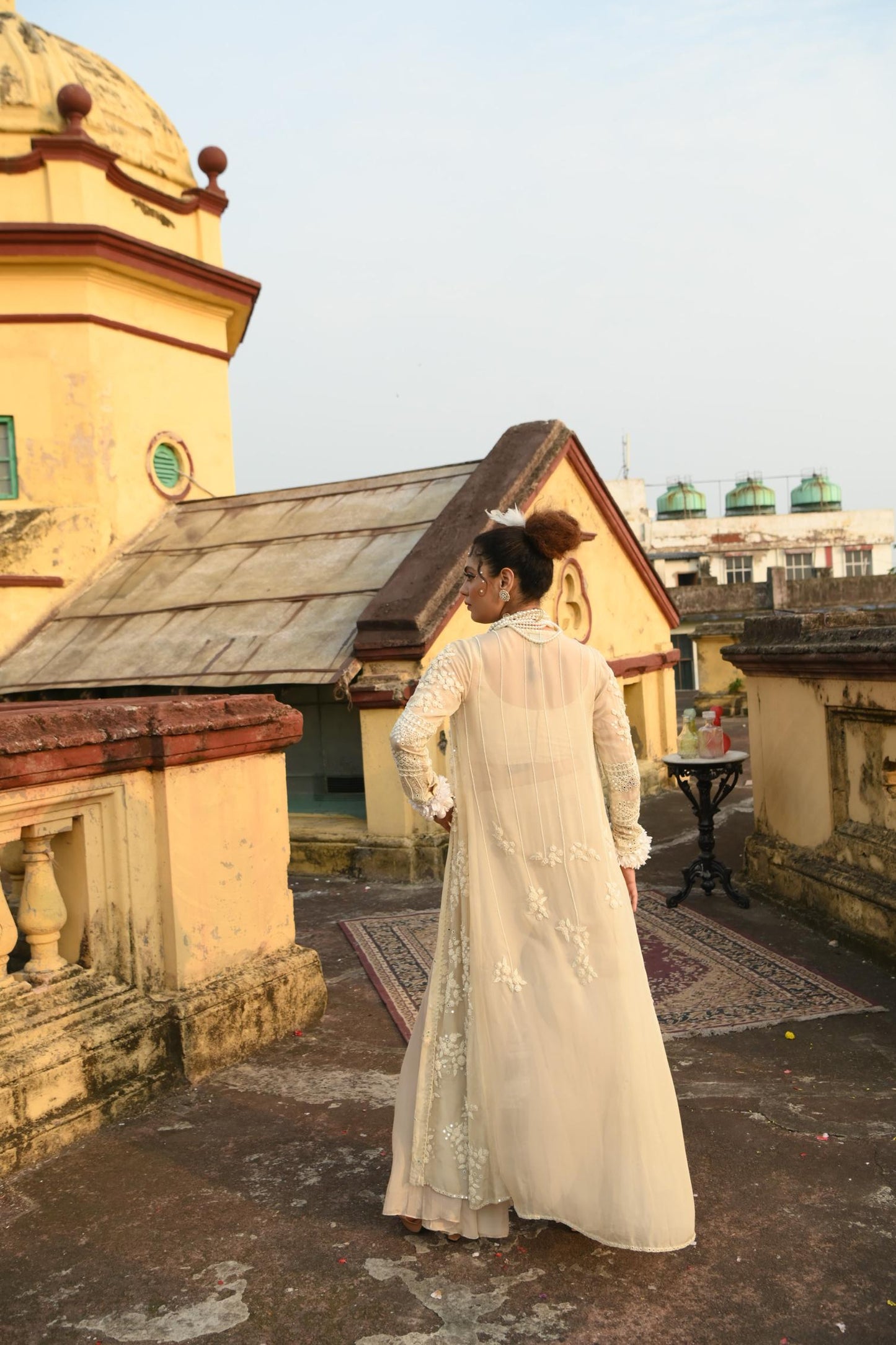 "Knurl" cape, Bustier & flared pants