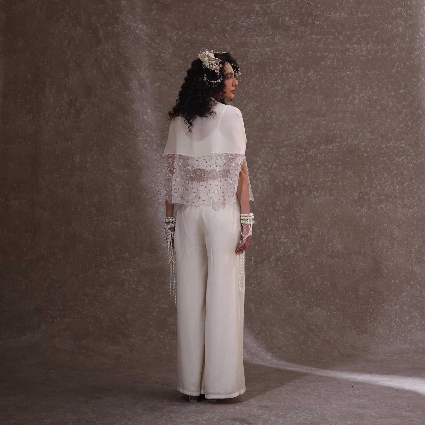 "Cradle" Cape With Flared Pants & a bustier.