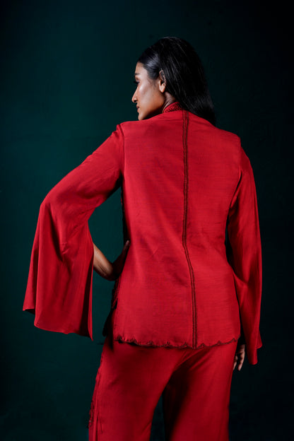 red pant suit