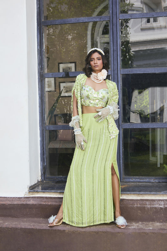 "Sorrell" Cape with embroidered blouse and "Reaf" skirt.