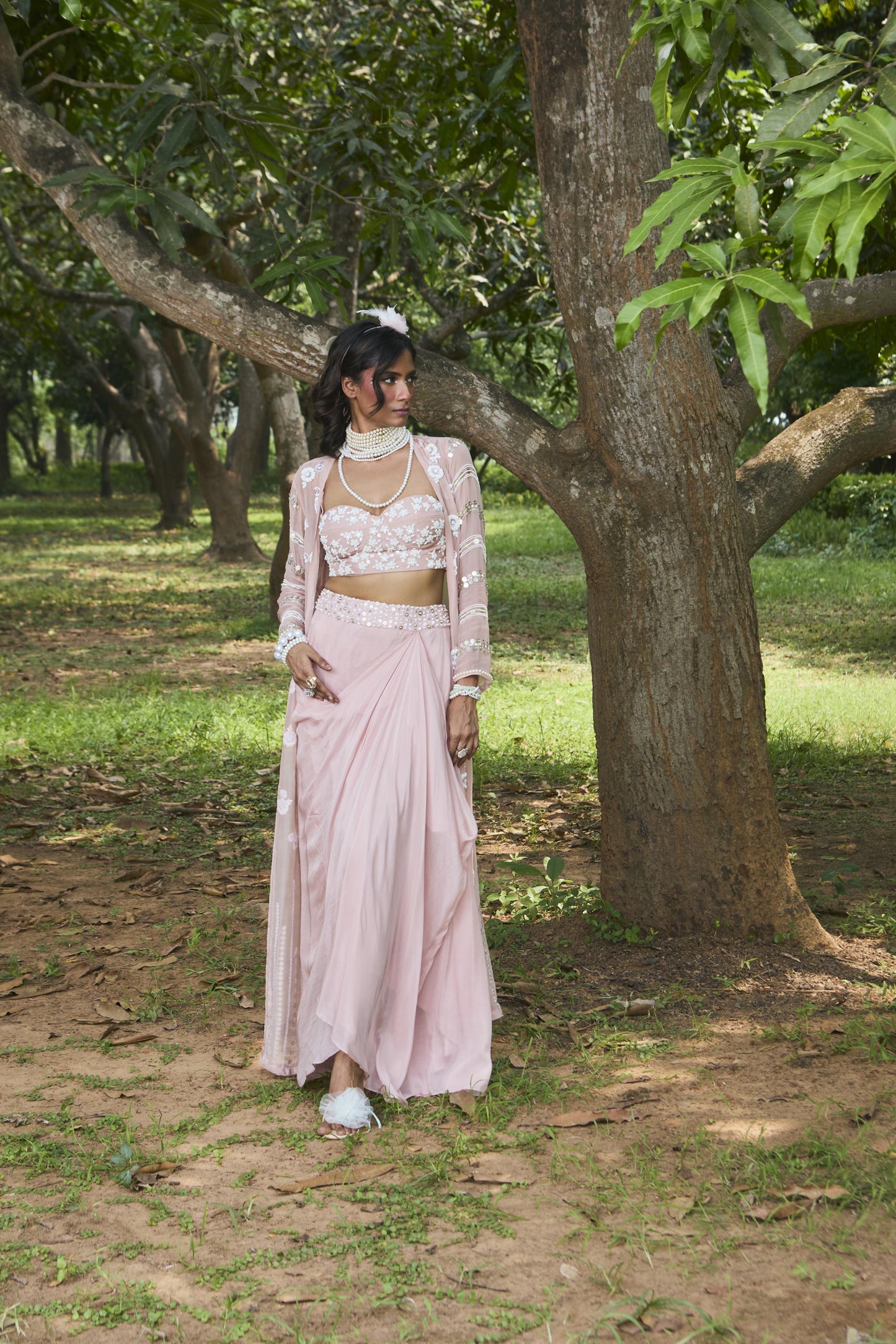 "Linn" Jacket with embroidered bustier & drape skirt.