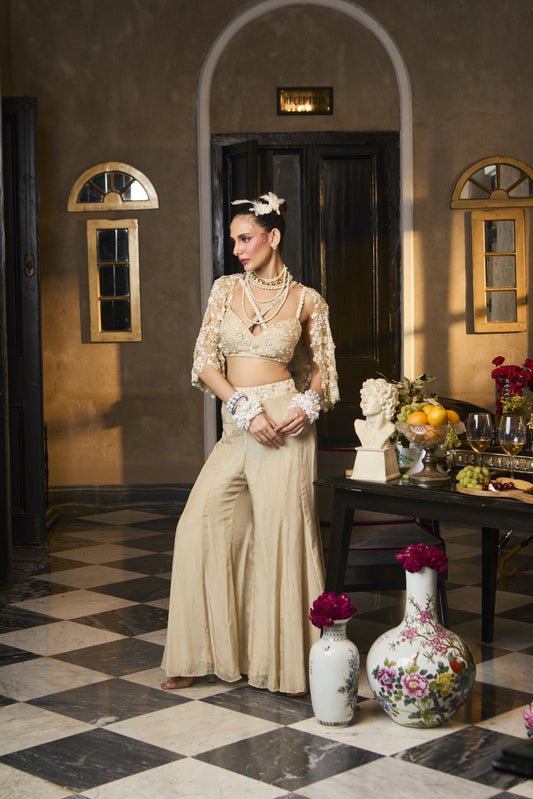 "Twine" cape with embroidered blouse and pants