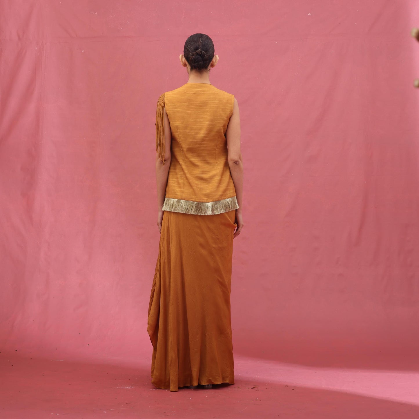 "Quell" Waistcoat with drape Skirt.